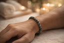 Male Hand wearing EEBracelet African Turquiose a beaded bracelet 