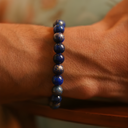 EEBracelet Lapis Lazuli on a wrist with a blurred background