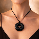 EEMedallion Black Obsidian unique circular pendant necklace worn on a black cord 