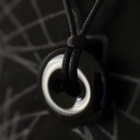 EEMedallion Black Obsidian against a dark background