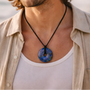 Person wearing EEMedallion Lapis Lazuli outdoors