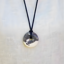 EEMedallion Zebra Jasper on a plain background