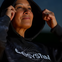 Adult women wearing a EEsystem Hoodie